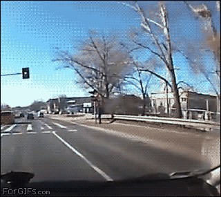 http://forgifs.com/gallery/d/199902-1/Pedestrian-close-call.gif
