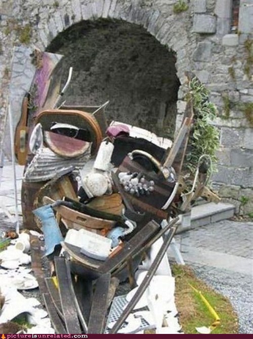 http://cheezpictureisunrelated.files.wordpress.com/2012/04/wtf-photos-videos-trash-man.jpg